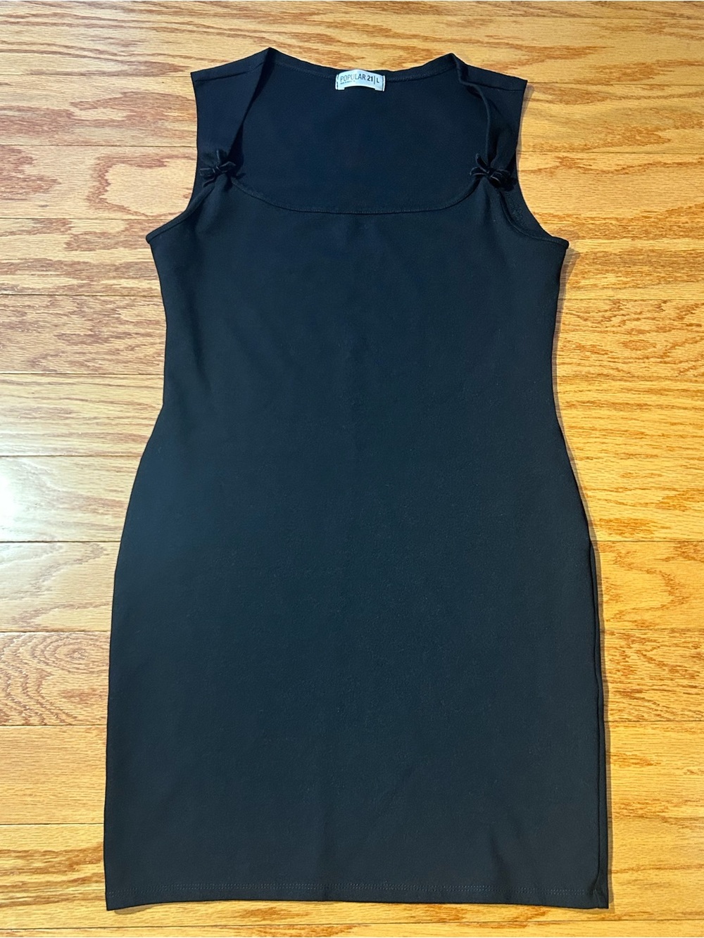 Black Sleeveless Midi Sheath Dress with Bow Accents
